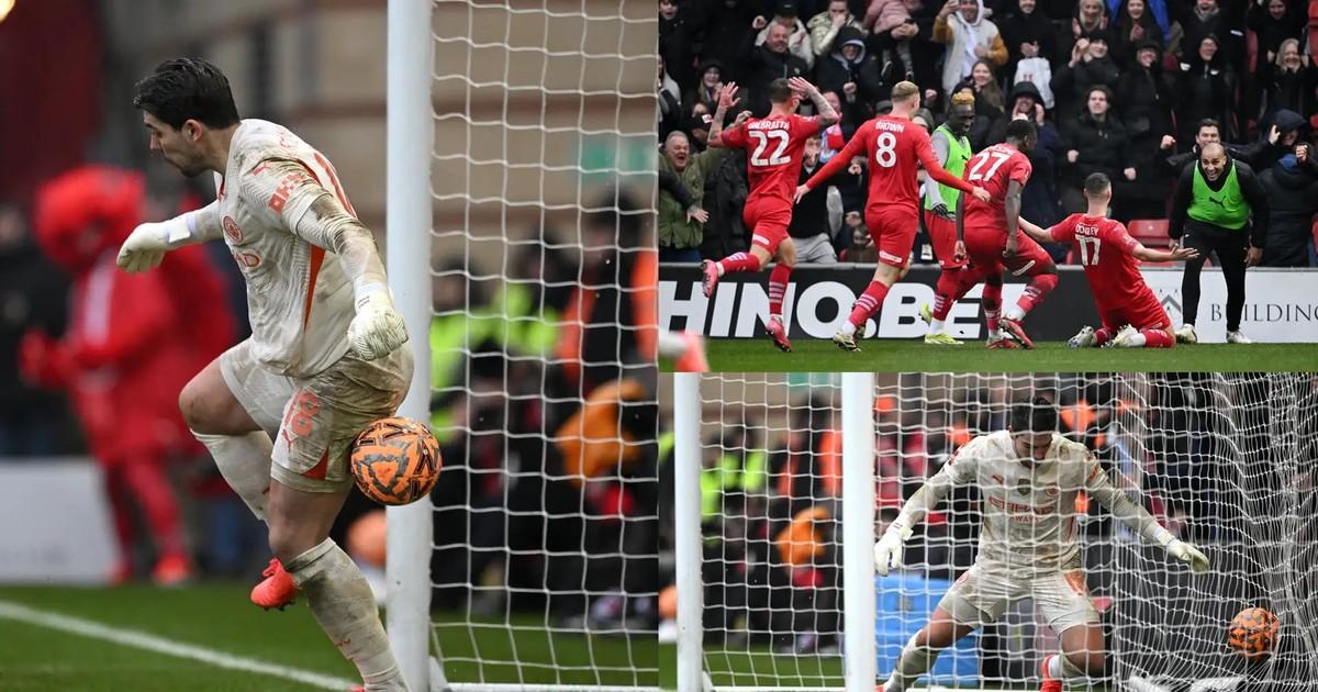 Hình ảnh một siêu sao Premier League ăn mừng bàn thắng quyết định trong một trận đấu quan trọng dưới ánh đèn sân vận động